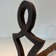 Pair of Modernist Andirons in Cast Iron with Stylised Figure Supports, by Ray
