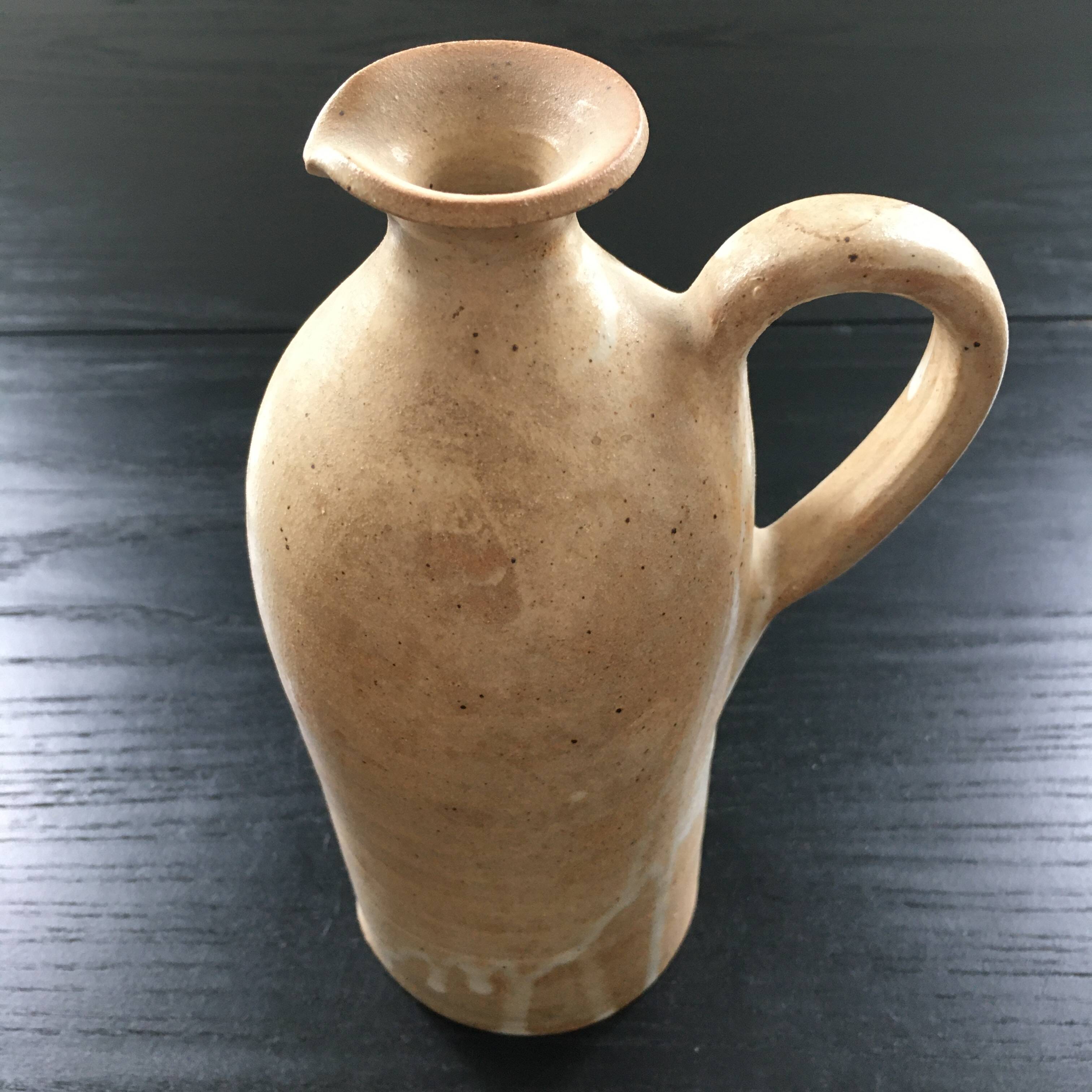 Beige stoneware bottle