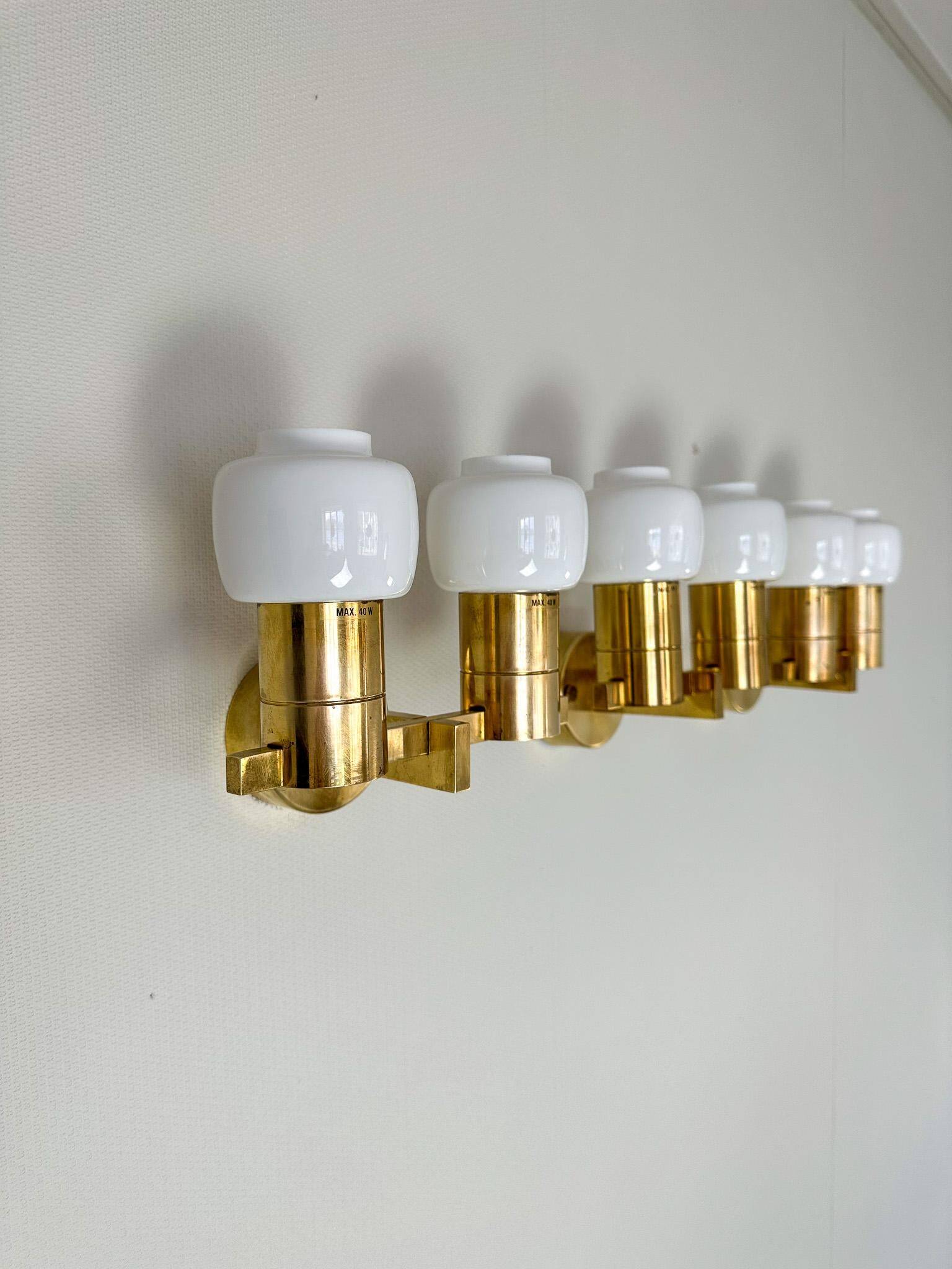 Brass and opaline glass wall lamps by Hans-Agne Jakobsson in mid-century style, Sweden, 1960s.