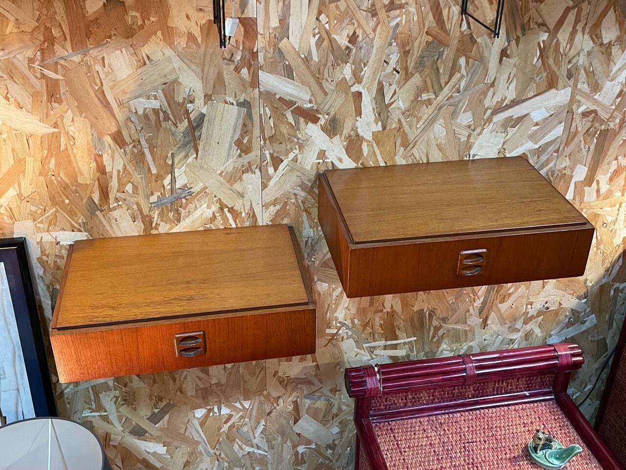 Suspended teak bedside tables in vintage 1960s Scandinavian style.