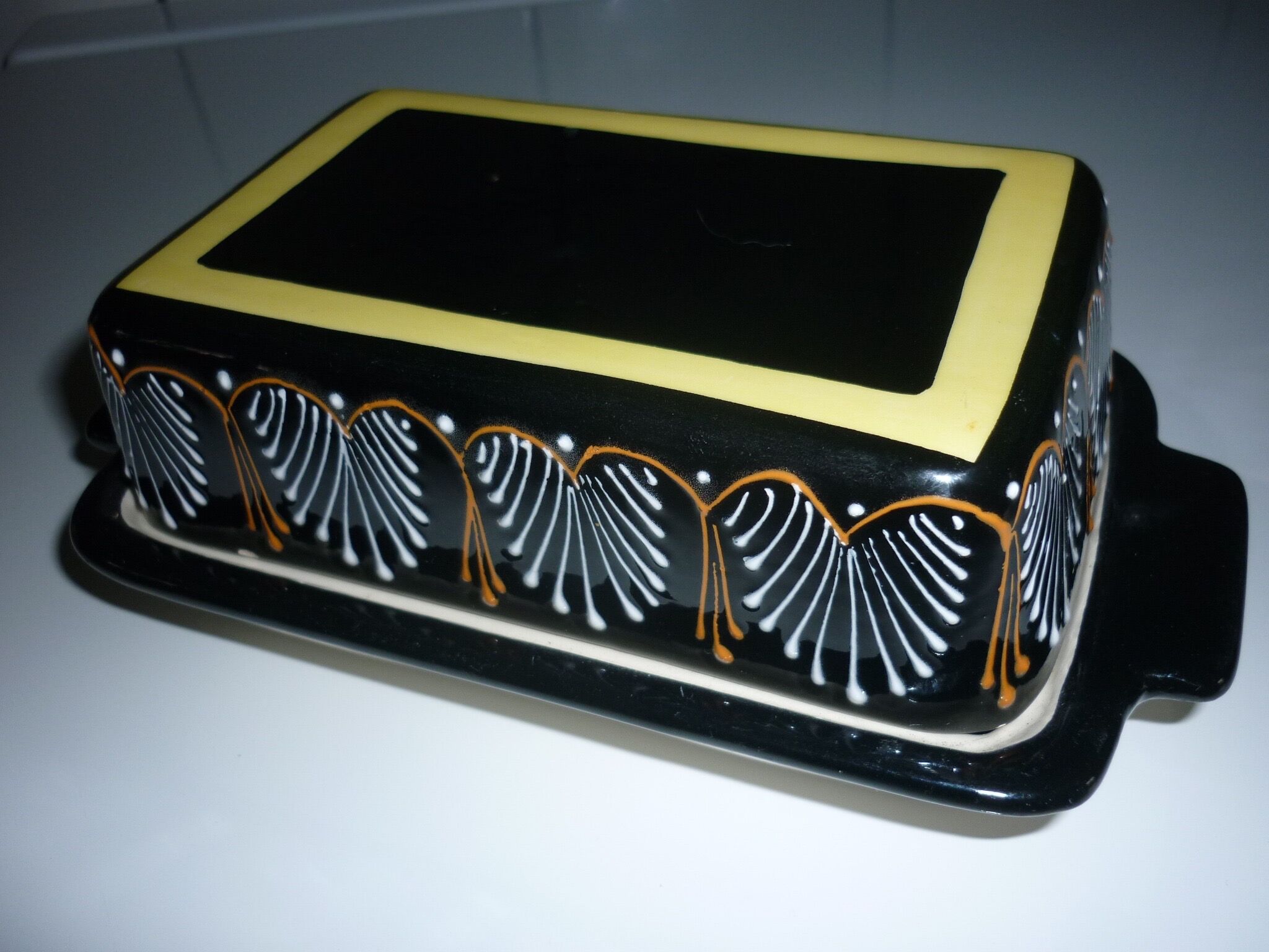 Butter dish with its black lid signed HB