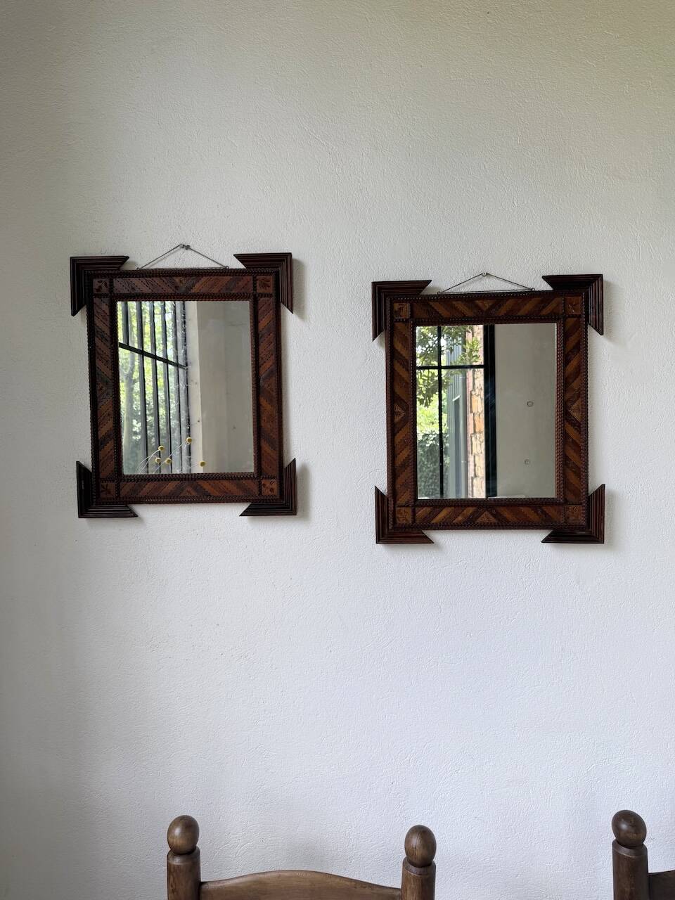 Pair of wooden mirrors in tramp art style