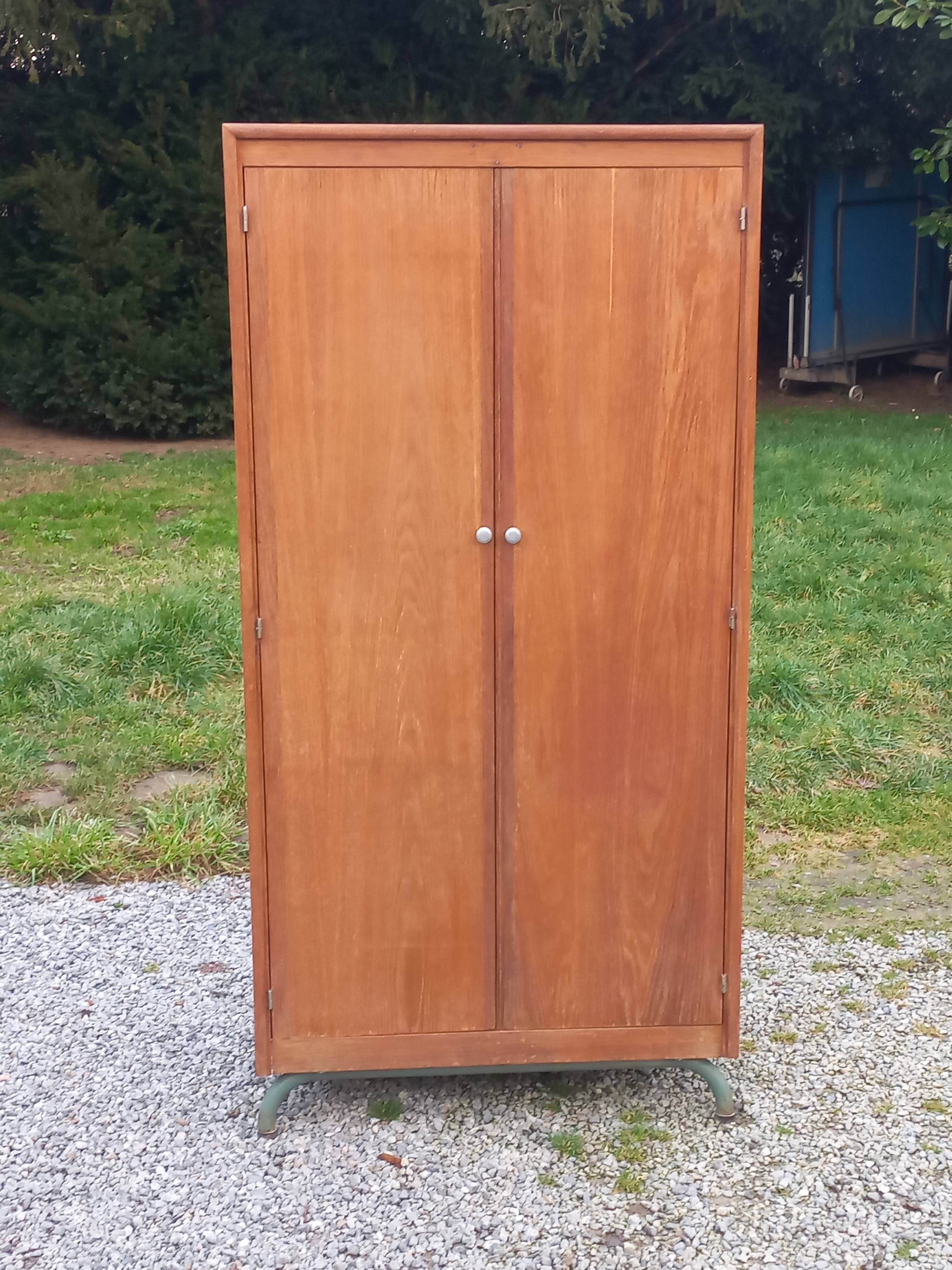 Vintage oak wardrobe with metal legs from the 1950s.