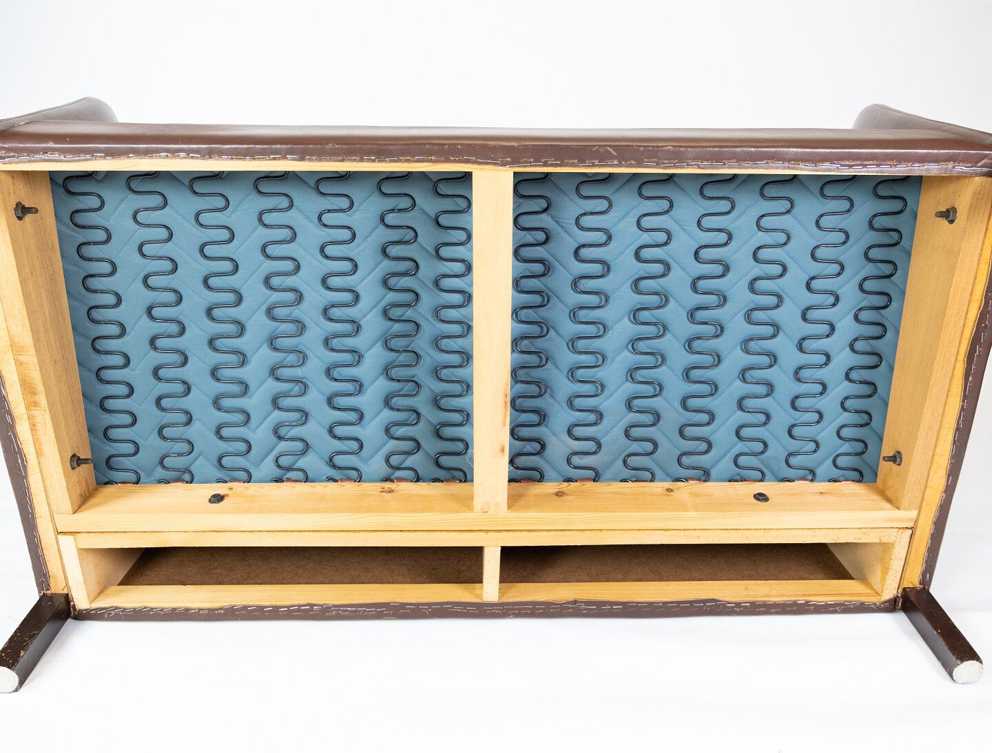 Two seater sofa upholstered with dark brown leather of danish design , by Stouby Furniture