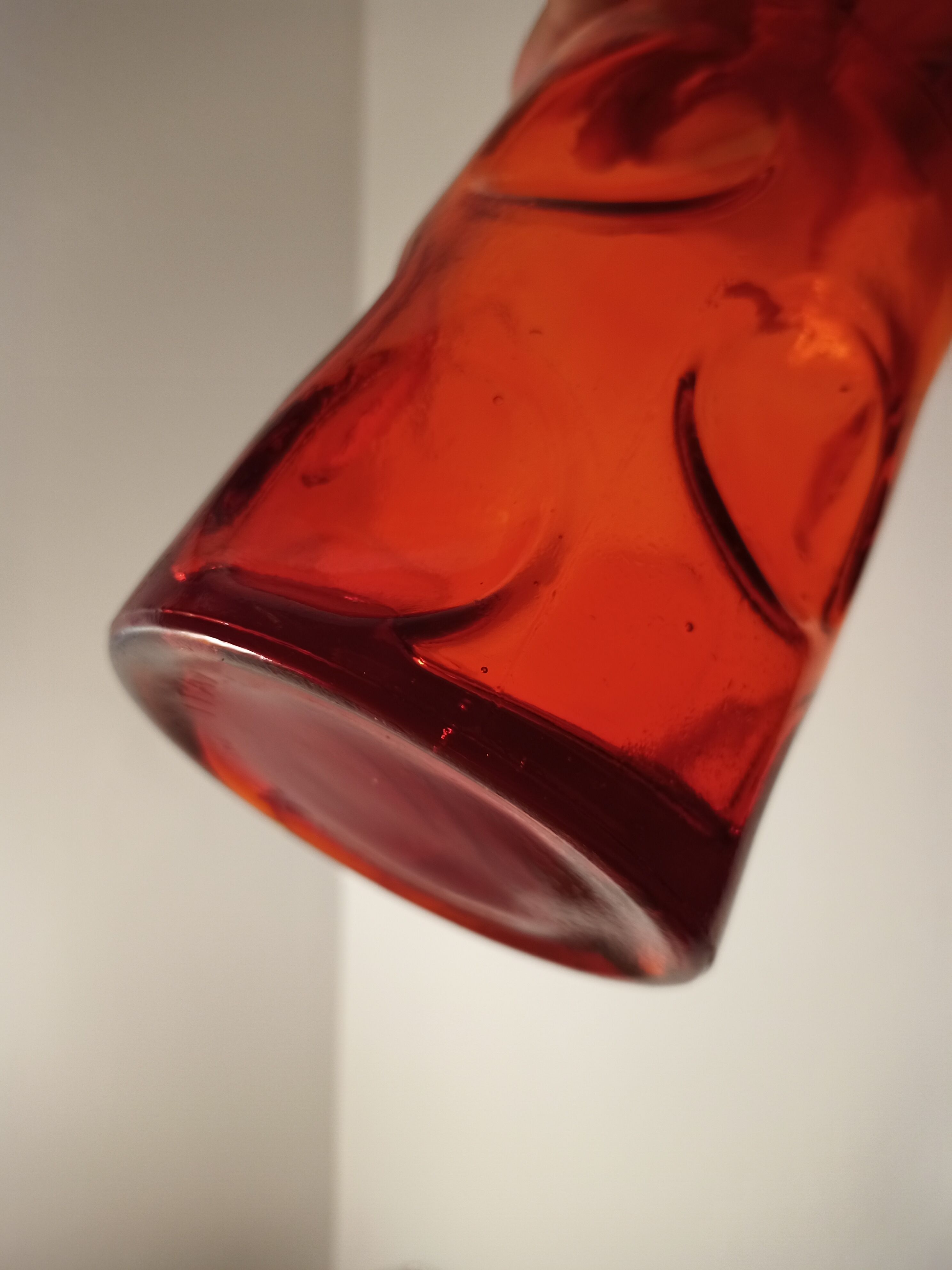 Red carafe with molded glass with hollow bubbles