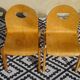 Pair of light wood chairs with post-formed seat and backrest.