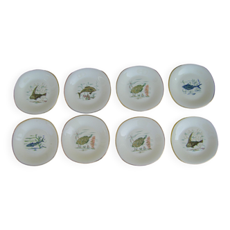 Eight vintage fish plates