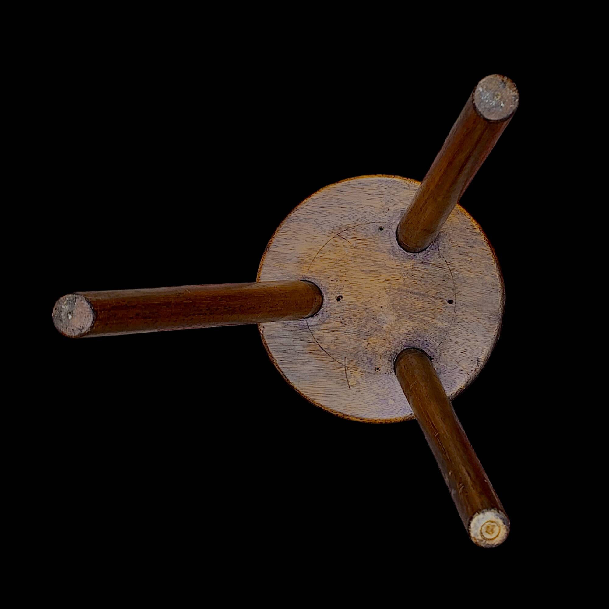 Old small wooden tripod stool