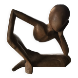Pensive man wooden statue