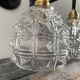 Set of two chiseled glass sconces