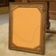 19th-century mirror in wood and stucco with floral decoration.