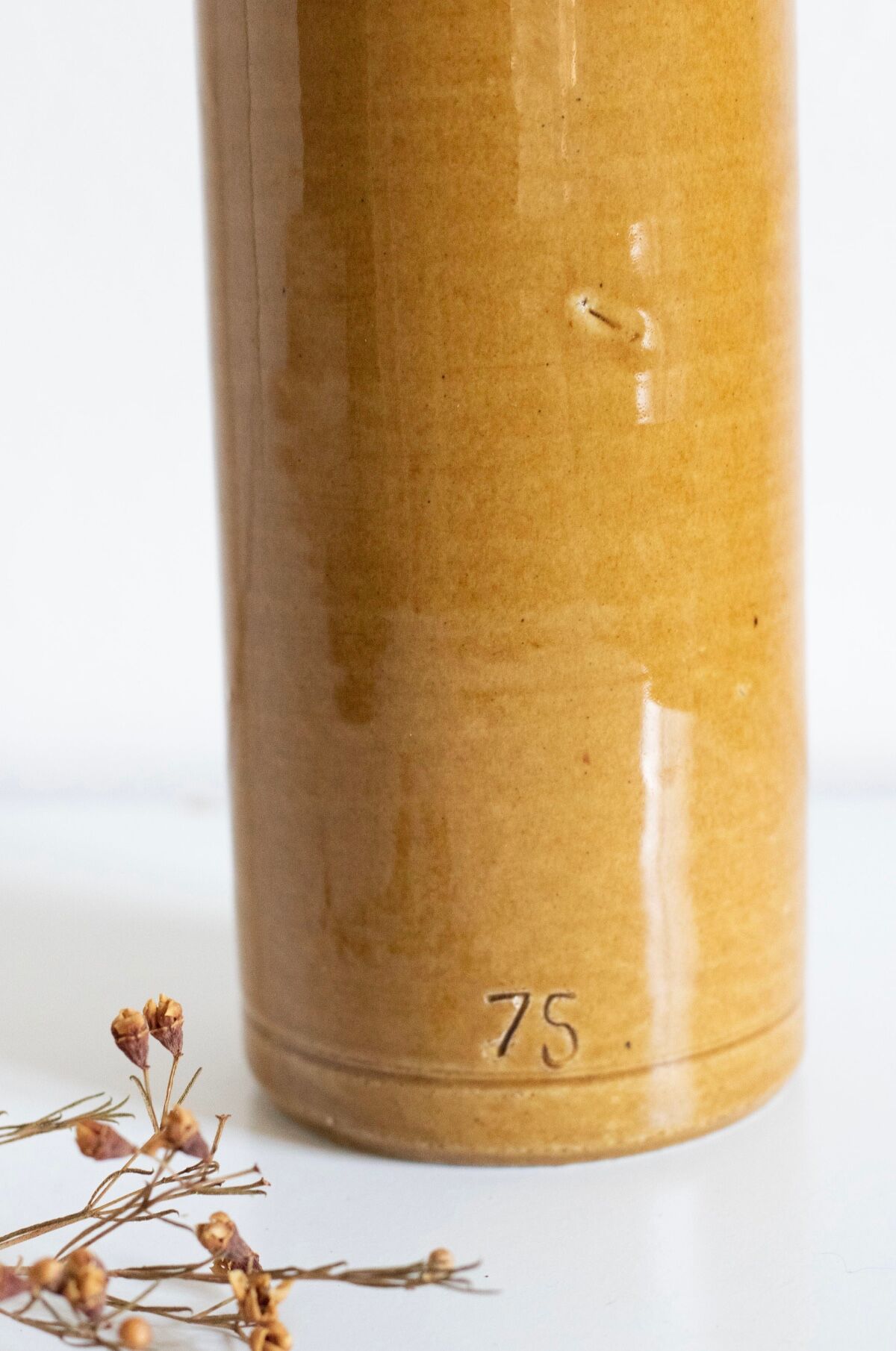 Enamelled stoneware bottle