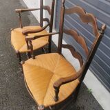 Pair of blackened wooden armchairs