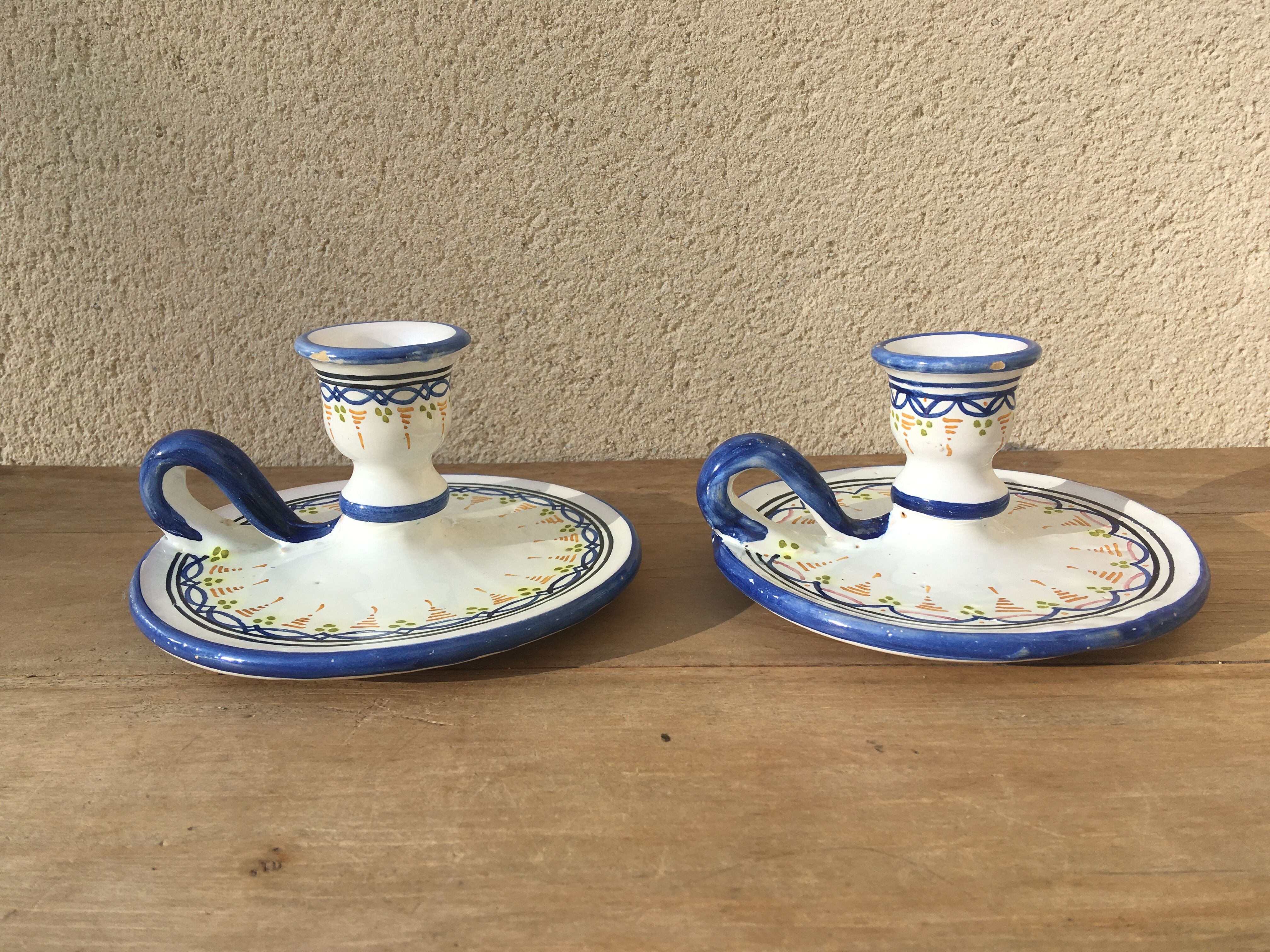 Pair of ceramic cellar rat candle holders