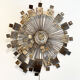 Brutalist Sunburst wall sculpture by Curtis Jere. USA, 2000s