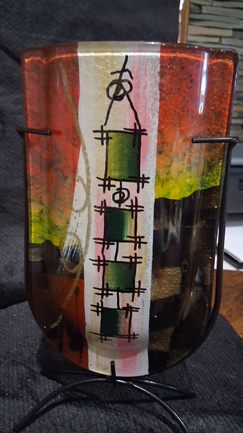 Multicoloured vase in the style of Dali.