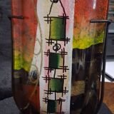 Multicoloured vase in the style of Dali.