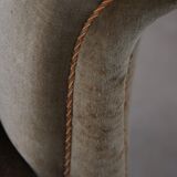 Mid-20th century, pair of Danish shell lounge chairs in green velvet, 1940s.