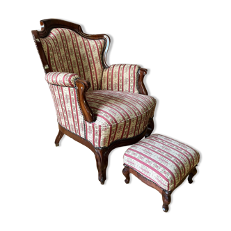Louis Philippe style armchair with footrest from the 19th century.
