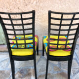 Pair of chairs upholstered with wax fabric