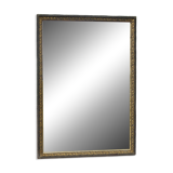 Mirror with black and gold frame, embossed vine leaves