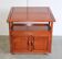 Hardwood Chinese buffet with a top, single tier and wheels.