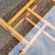 Modernist vintage square coffee table, in wood and old glass