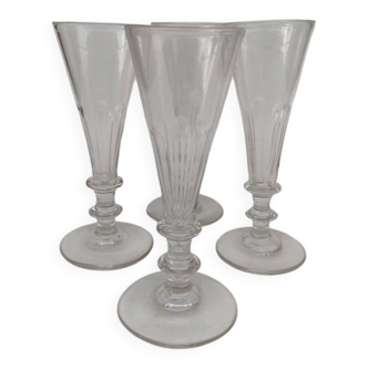 4 glass champagne flutes, 19th century.