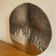 Wall-mounted aluminum plate with mountain design