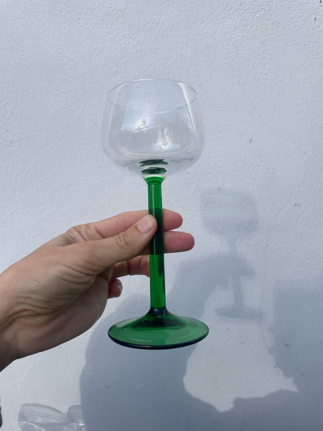 7 green glass stemmed glasses
