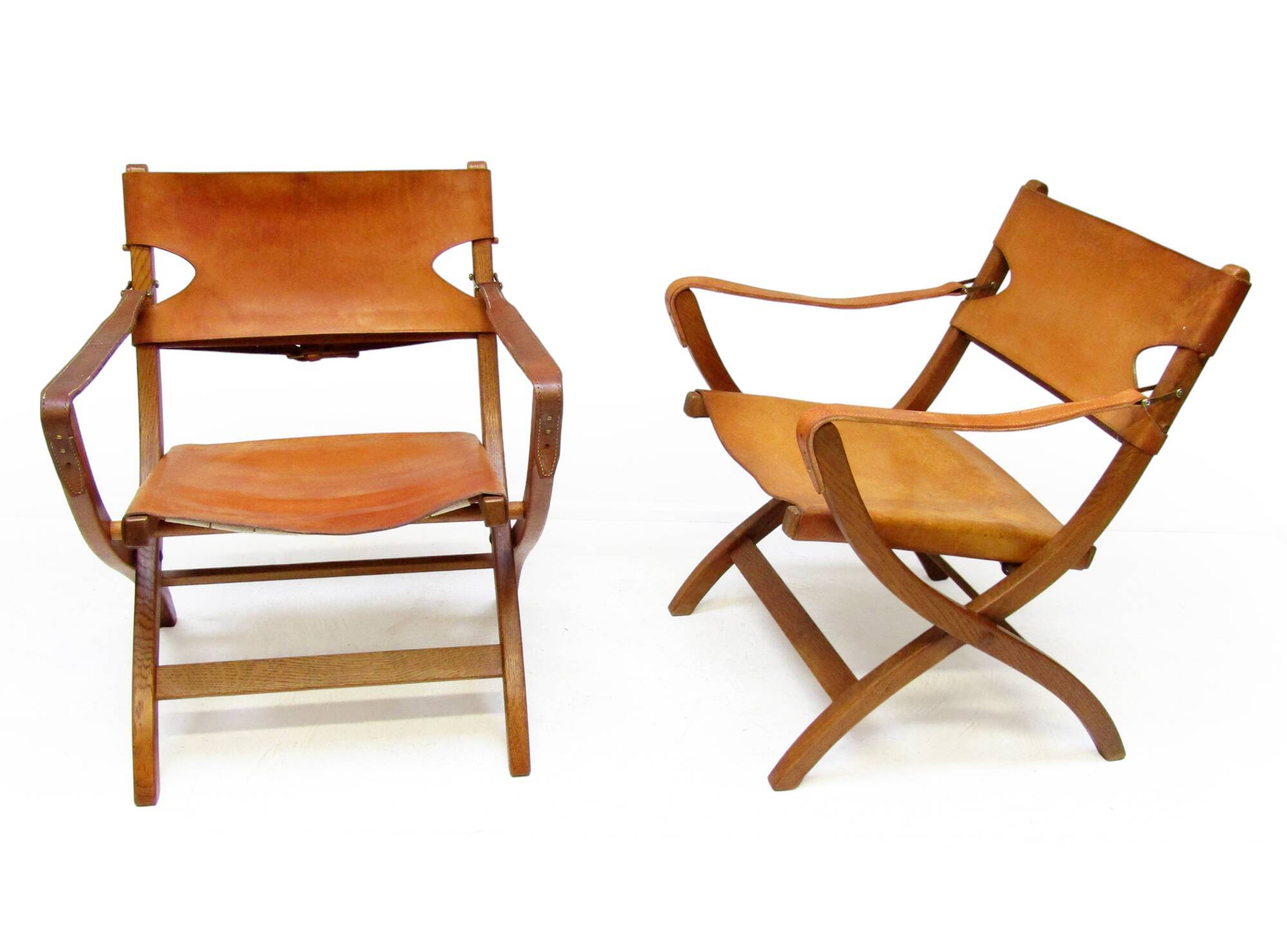 Two 1950s Danish Safari Chairs In Oak & Hide Leather by Poul Hundevad