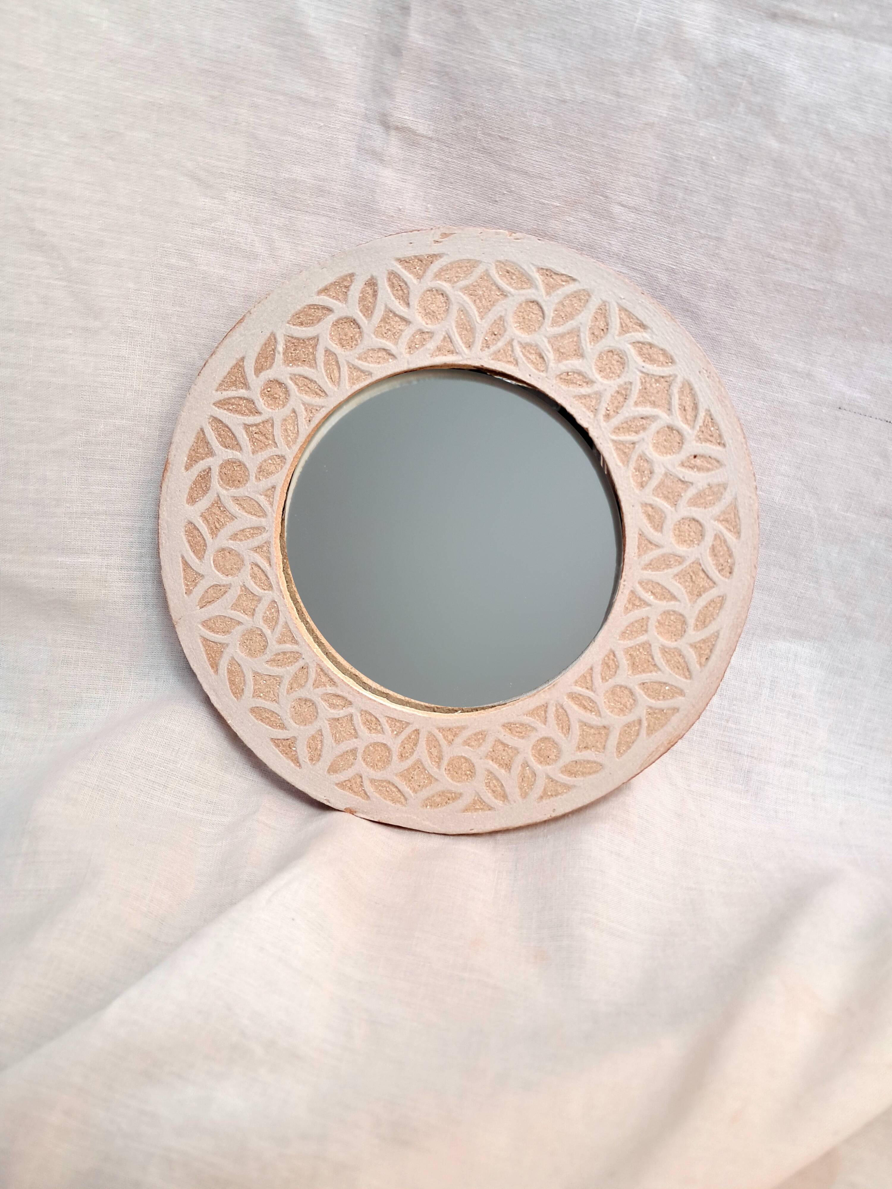 Stoneware mirror with sgraffito decoration