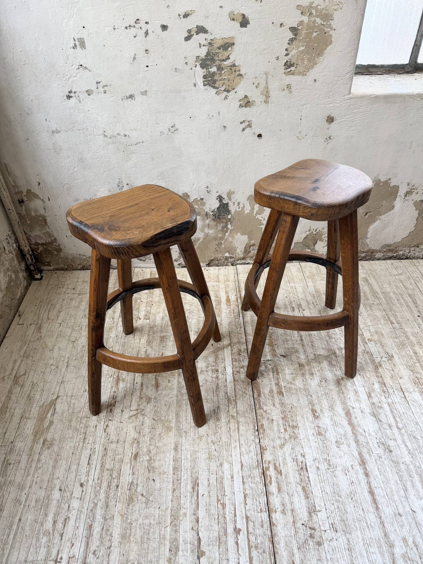 Pair of Henri Bataille stools in oak