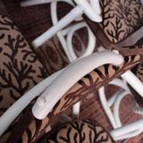 4 white rattan chairs