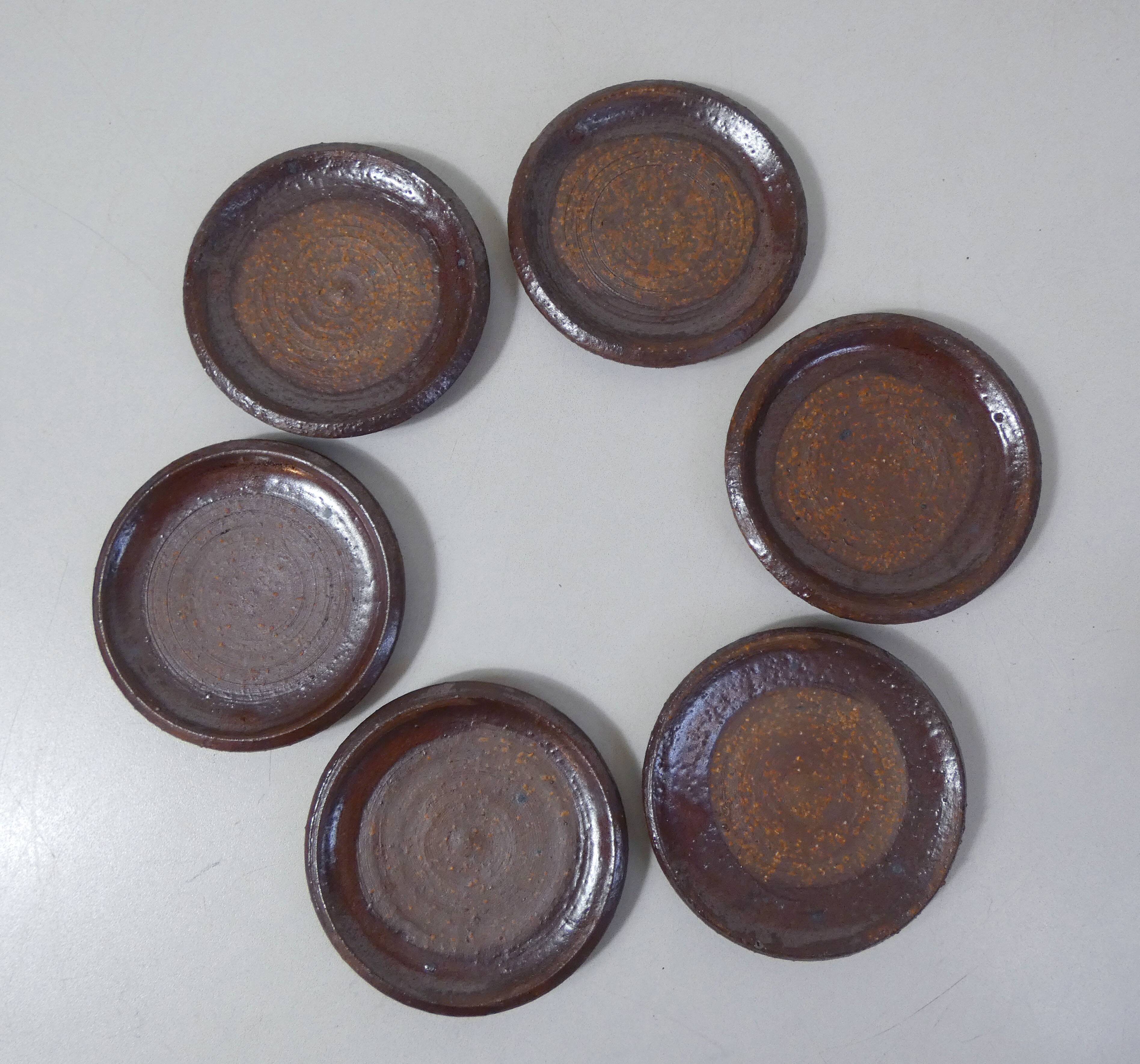 coffee service in iridescent stoneware cups and vintage sugar bowl