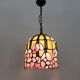 Tiffany pendant lamp in glass paste with floral decoration.