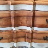 Walnut crossbow chest of drawers