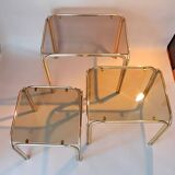 3 vintage golden nesting tables with smoked glass.