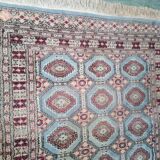 Old handmade wool oriental rug. 190 x 126cm