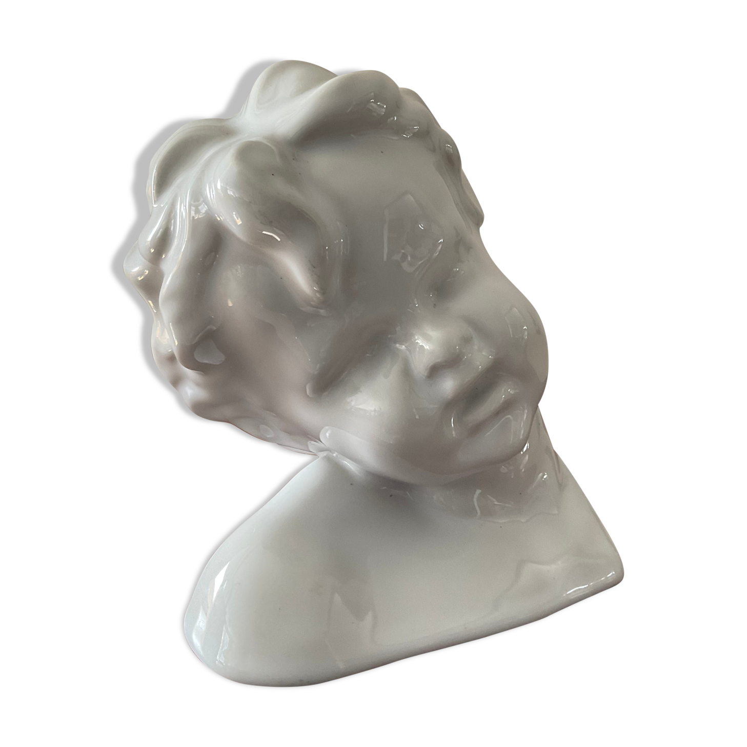 Cherub child bust in enamelled porcelain