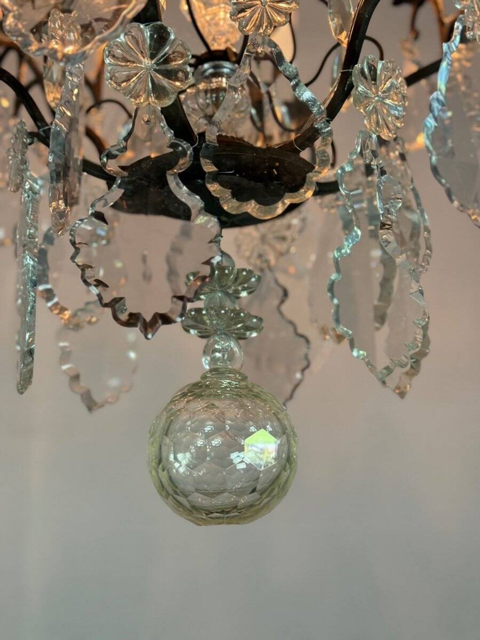Black patinated bronze cage chandelier decorated with cut crystal pendants circa 1900