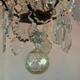 Black patinated bronze cage chandelier decorated with cut crystal pendants circa 1900