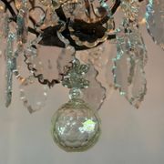 Black patinated bronze cage chandelier decorated with cut crystal pendants circa 1900