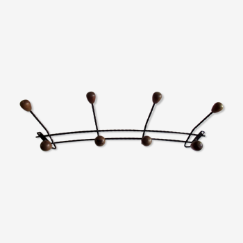 Coat racks, twisted iron and wooden balls
