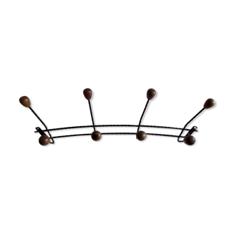 Coat racks, twisted iron and wooden balls