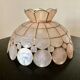 Suspension en nacre rose et laiton
