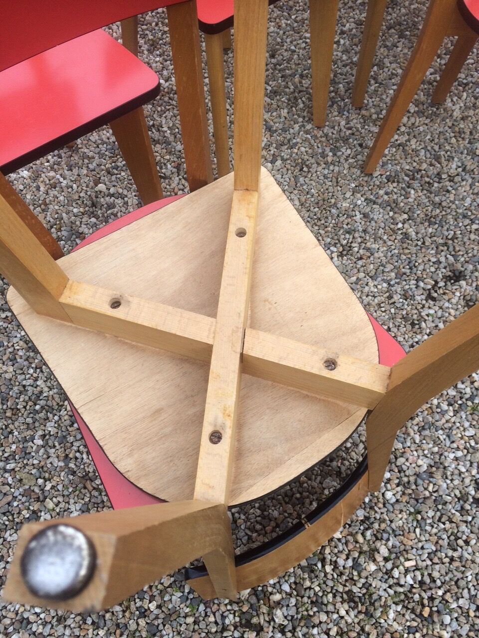 Eight wooden and formica chairs