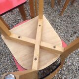 Eight wooden and formica chairs
