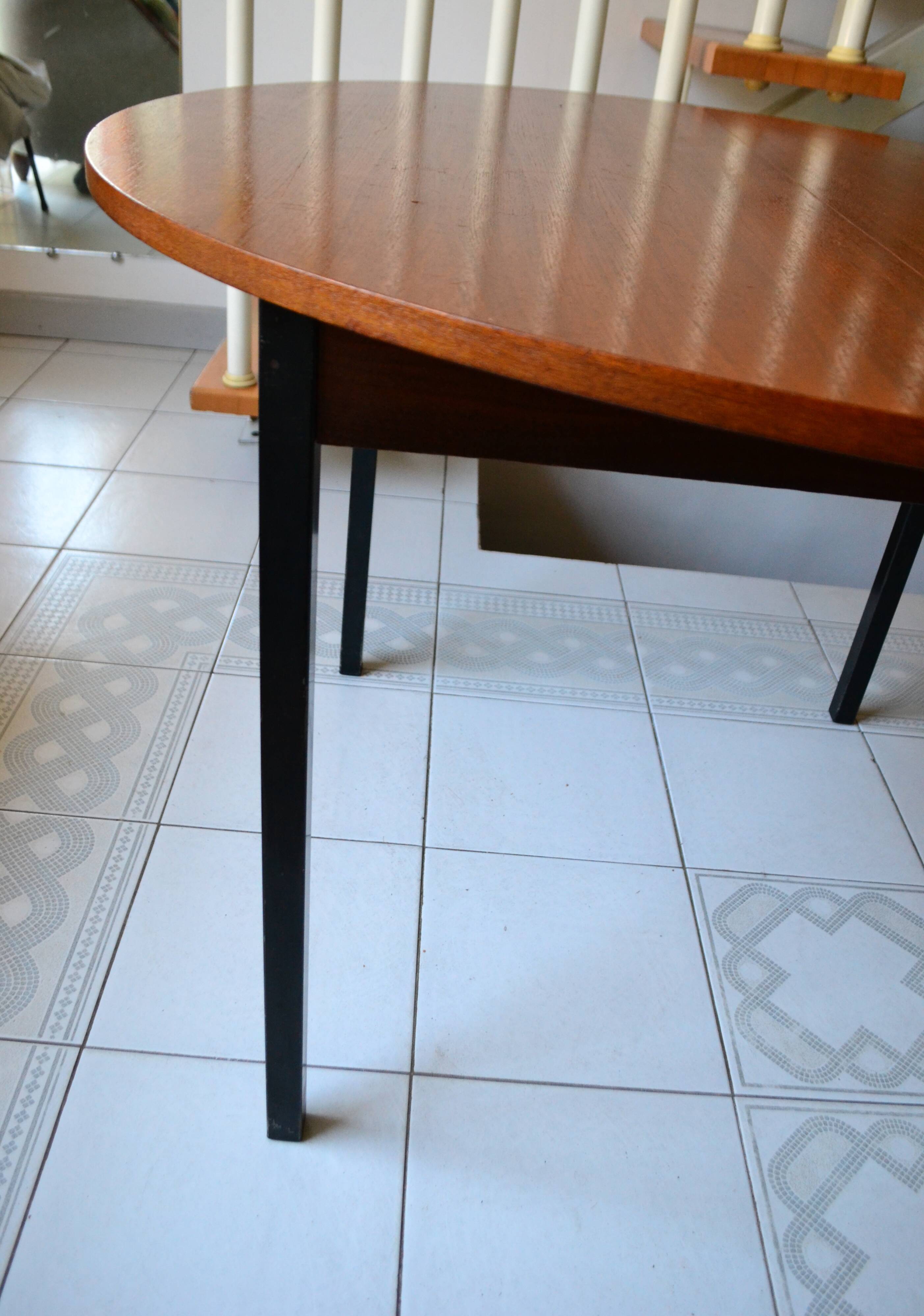 Dining table Pierre Guariche, teak and black steel from the 1960s with extension.