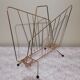 Vintage magazine holder in gilded brass.